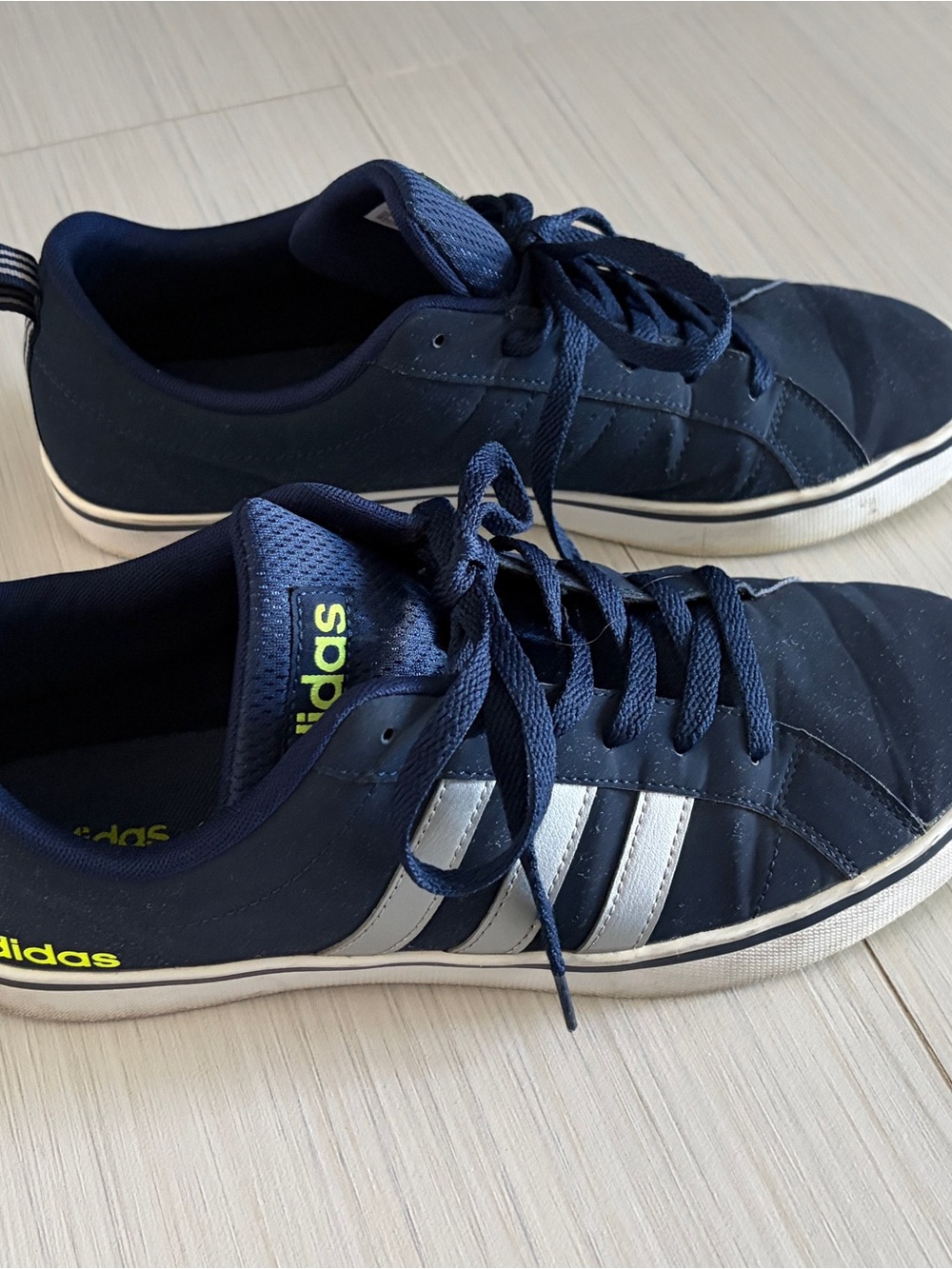Adidas Men’s Navy Athletic Casual Sneakers with silver stripes